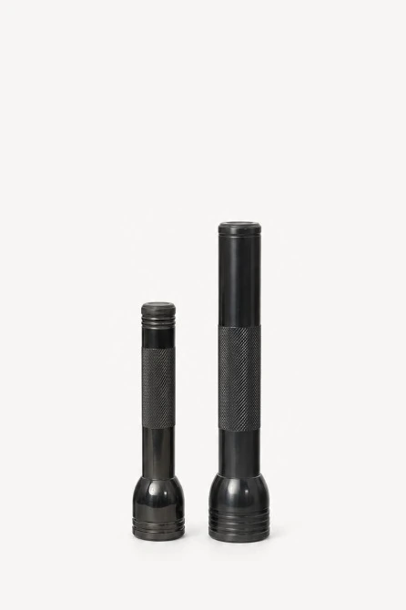 Studio listing photo of two flashlights on white